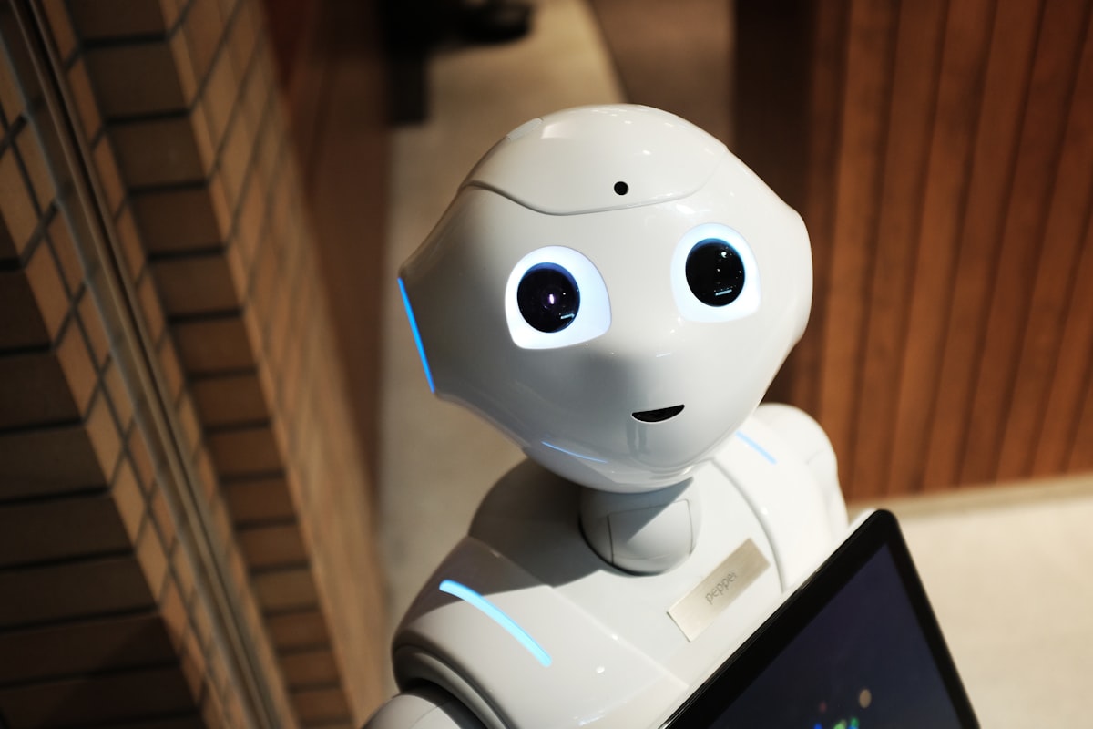Futuristic AI tech workspace, glowing white and black interfaces, holographic screens, monochrome setup, premium cinematic lighting, 8k resolution, ultra-realistic, no people, no woman